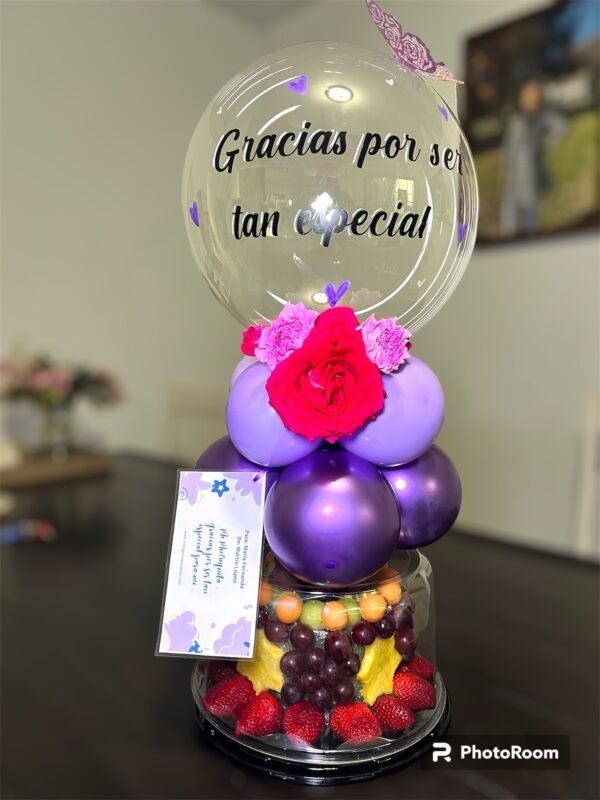 Fruit cake and balloon arrangement
